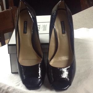 Hardly worn Black patent heels with open toe